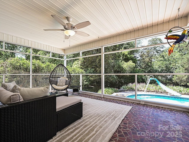 3600 Carmel Rd, Charlotte, NC 28226 - sunroom / solarium with a ceiling fan and view of wooded area
