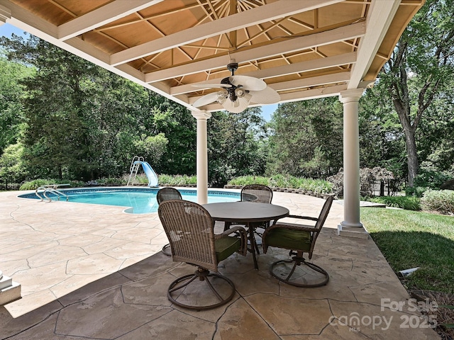 3600 Carmel Rd, Charlotte, NC 28226 - view of patio with view of scattered trees, ceiling fan, an outdoor pool, and outdoor dining area