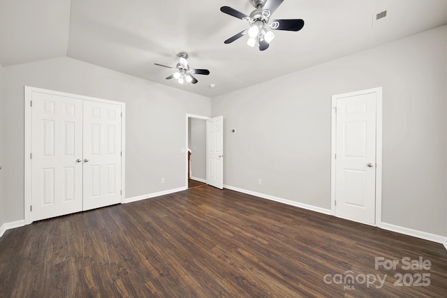 unfurnished bedroom with visible vents, a ceiling fan, baseboards, and wood finished floors