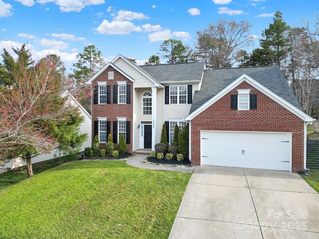 view of front of house with a front lawn, brick siding, and driveway