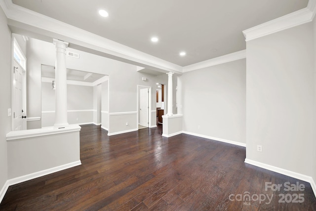 unfurnished living room with visible vents, wood finished floors, recessed lighting, baseboards, and ornate columns