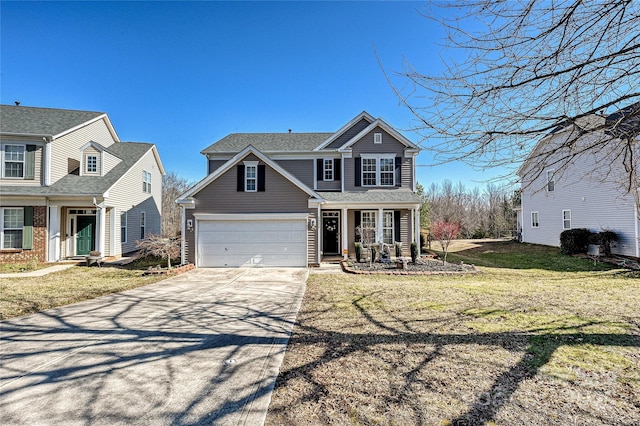 traditional-style house with a front lawn and concrete driveway