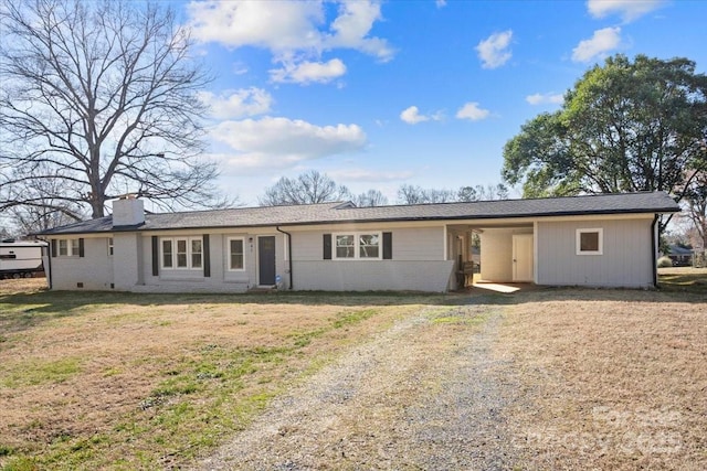 ranch-style home with a front yard