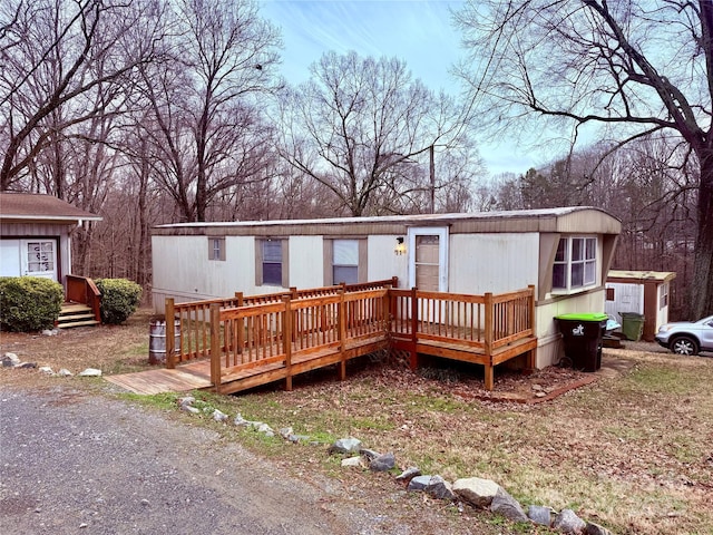 manufactured / mobile home featuring a deck