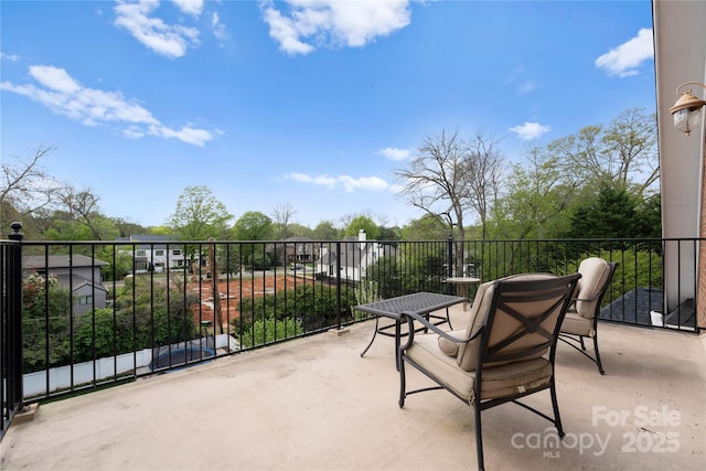 view of patio / terrace featuring a balcony