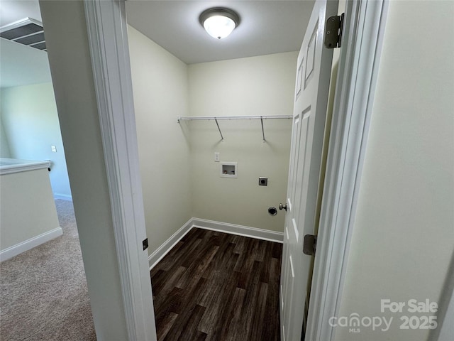 washroom featuring hookup for a washing machine, dark hardwood / wood-style floors, and hookup for an electric dryer