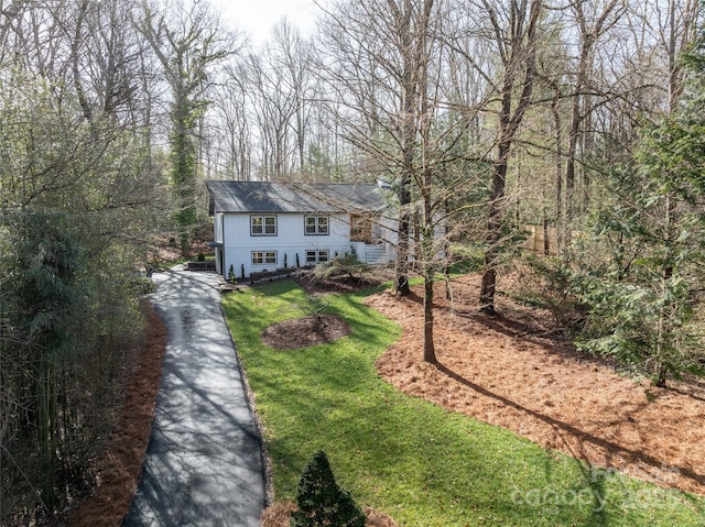 exterior space featuring a front lawn