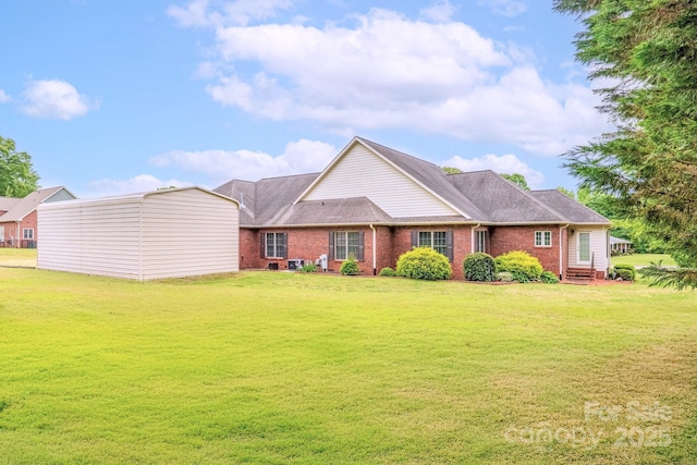 119 Era St, Troutman, NC 28166 - view of front of property with brick siding and a front lawn