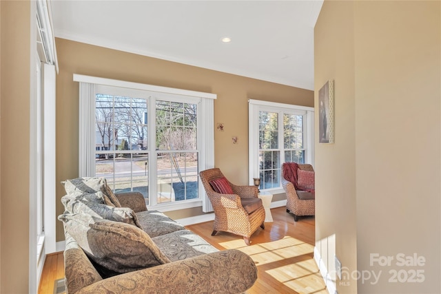 119 Era St, Troutman, NC 28166 - living area featuring wood finished floors, recessed lighting, and baseboards