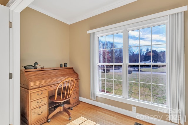 119 Era St, Troutman, NC 28166 - office space with crown molding, baseboards, light wood-style flooring, and healthy amount of natural light