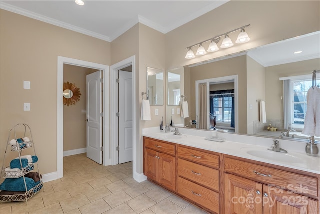 119 Era St, Troutman, NC 28166 - bathroom with double vanity, ornamental molding, tile patterned floors, and baseboards