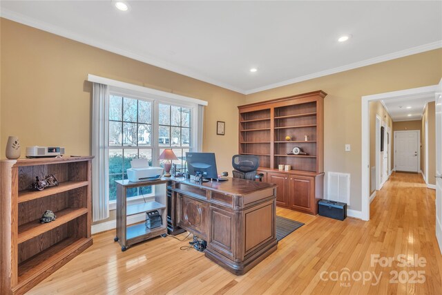 119 Era St, Troutman, NC 28166 - home office featuring light wood-style flooring, crown molding, recessed lighting, and baseboards