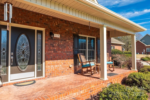 119 Era St, Troutman, NC 28166 - entrance to property featuring brick siding and covered porch