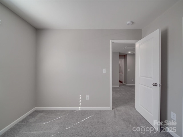 spare room featuring carpet flooring