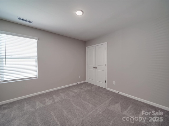 view of carpeted empty room