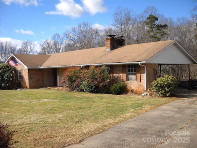 single story home with brick siding, driveway, a carport, a front lawn, and a chimney