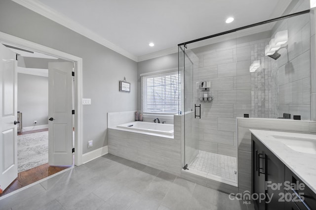 full bath with vanity, baseboards, ornamental molding, a shower stall, and a bath