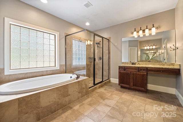 full bathroom featuring visible vents, baseboards, a garden tub, vanity, and a shower stall