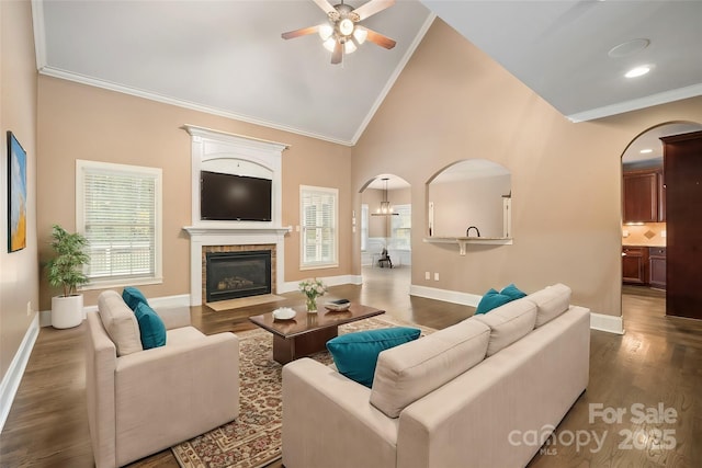 472 Barber Loop, Mooresville, NC 28117 - living area featuring a wealth of natural light, ceiling fan, wood finished floors, and arched walkways