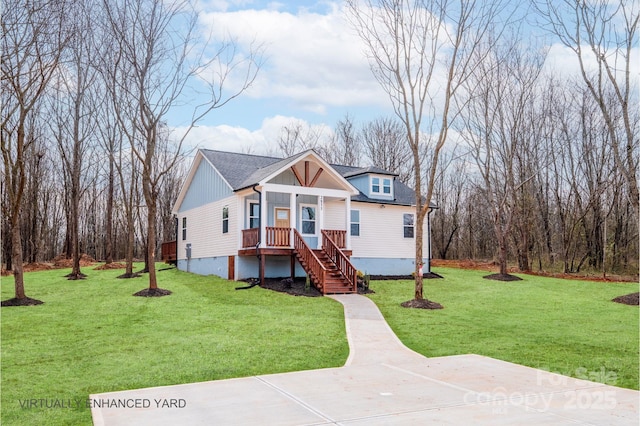 view of front of property with a front lawn and board and batten siding