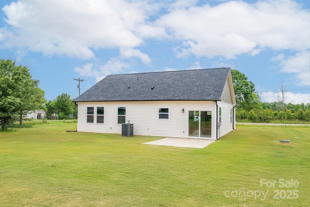 2867 W Zion Church Rd, Shelby, NC 28150 - rear view of property featuring a patio, cooling unit, a yard, and roof with shingles