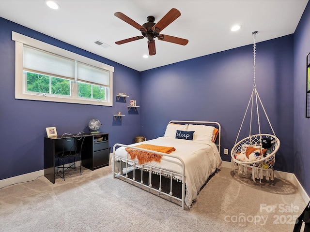 carpeted bedroom with ceiling fan