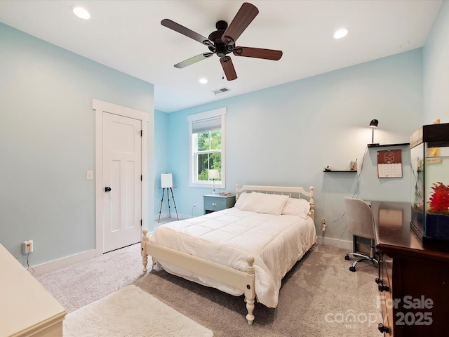 bedroom with light carpet and ceiling fan