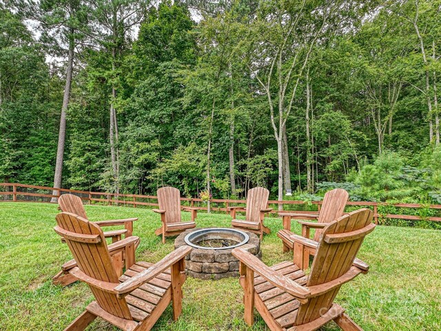 view of yard featuring a fire pit