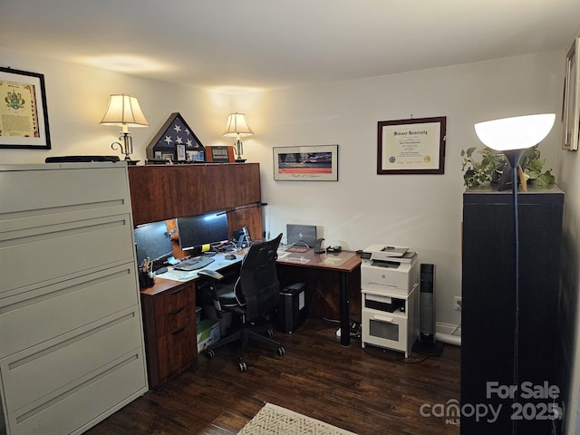 office space with dark hardwood / wood-style flooring