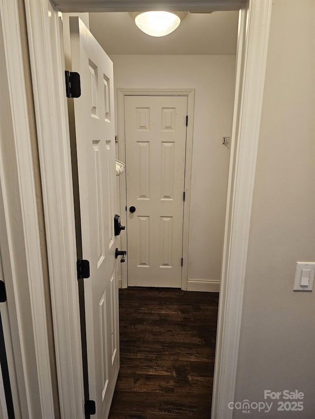 hall featuring dark hardwood / wood-style floors