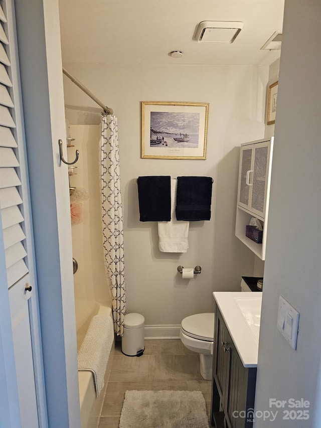 full bathroom with shower / tub combo, vanity, and toilet