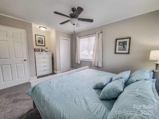 carpeted bedroom featuring ornamental molding, a closet, a ceiling fan, and baseboards