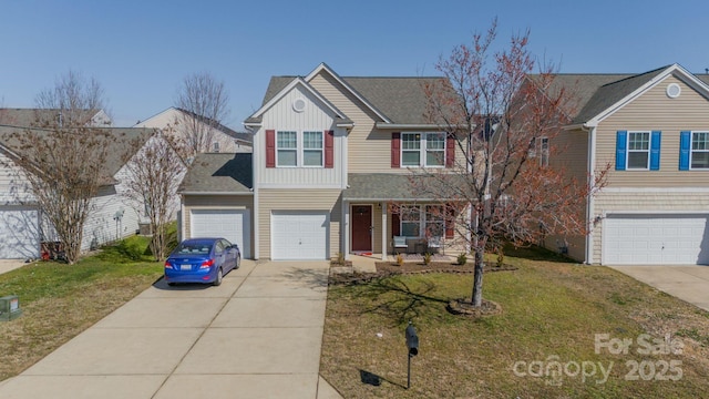 traditional-style house featuring concrete driveway, a front lawn, board and batten siding, and an attached garage