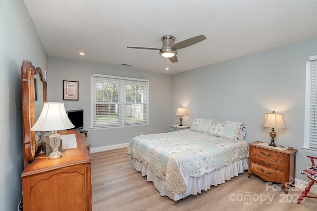 bedroom featuring recessed lighting, light wood-style floors, baseboards, a ceiling fan, and visible vents