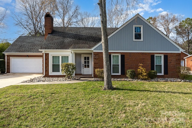 traditional-style home with a front lawn, a garage, brick siding, and concrete driveway