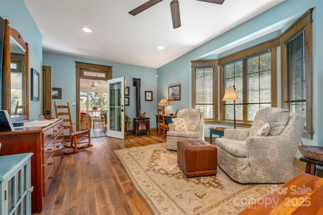 sitting room featuring dark hardwood / wood-style floors and ceiling fan