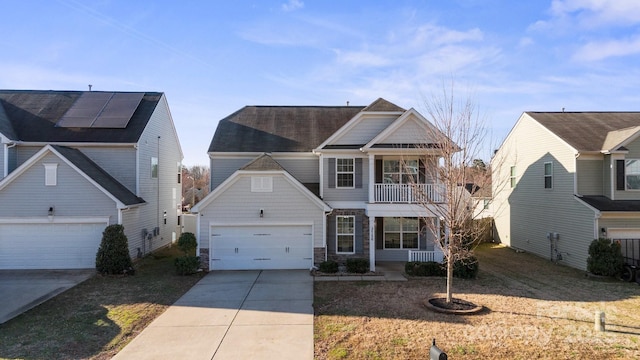 view of property featuring a balcony and a porch