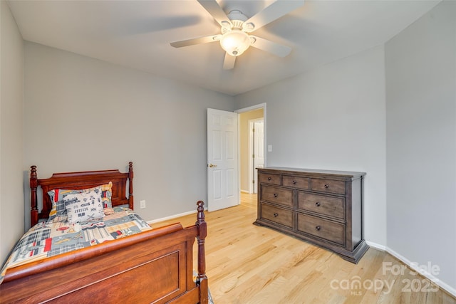 bedroom featuring ceiling fan and light hardwood / wood-style floors