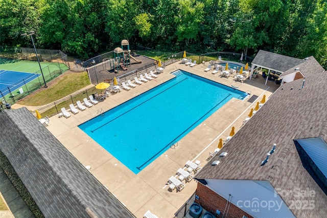 view of pool featuring a patio