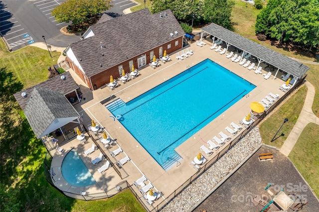 view of swimming pool with a patio area