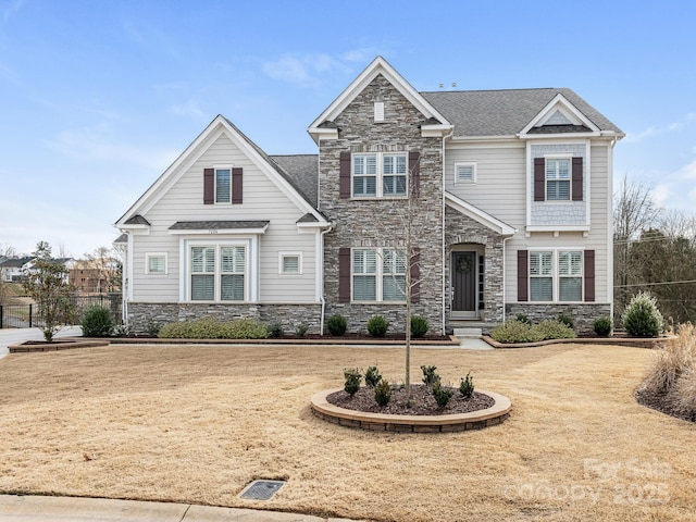 view of front facade featuring a front yard