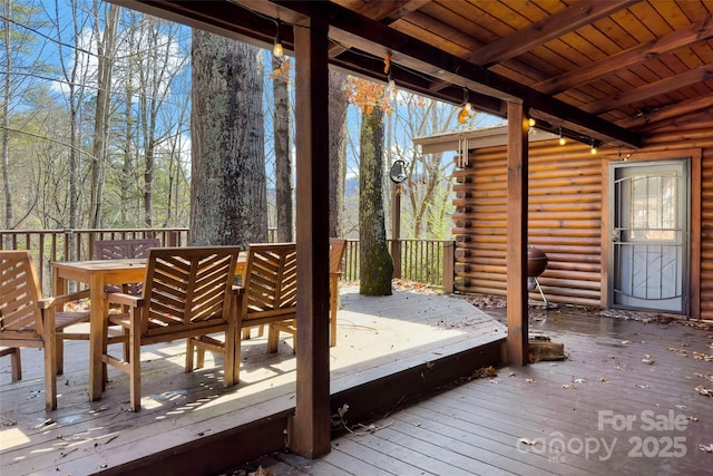 deck with outdoor dining space