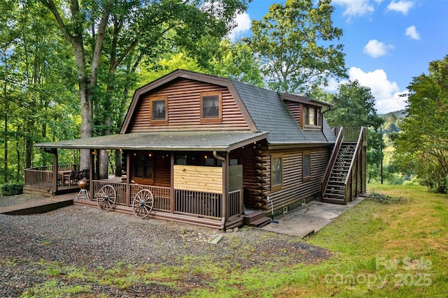 40/44 Chambers Dr, Weaverville, NC 28787 - log cabin with log siding, stairway, and a porch