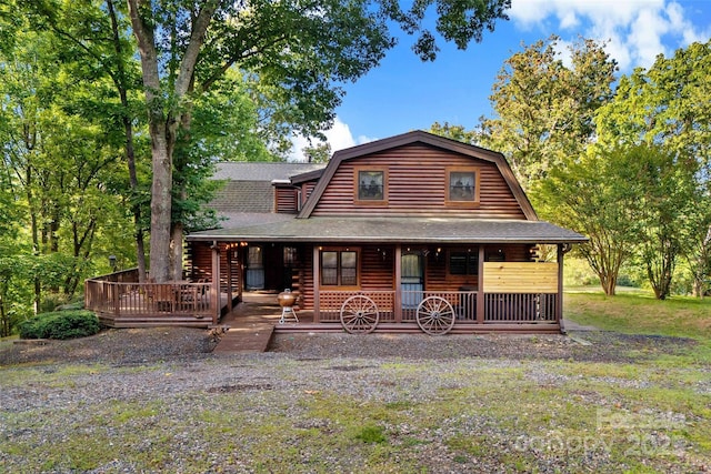 40/44 Chambers Dr, Weaverville, NC 28787 - log cabin featuring a shingled roof and a porch