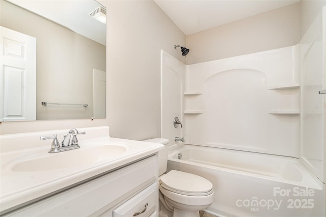 bathroom featuring shower / washtub combination, visible vents, vanity, and toilet