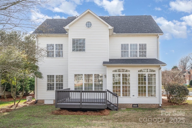 back of property featuring a shingled roof, crawl space, a yard, and a wooden deck