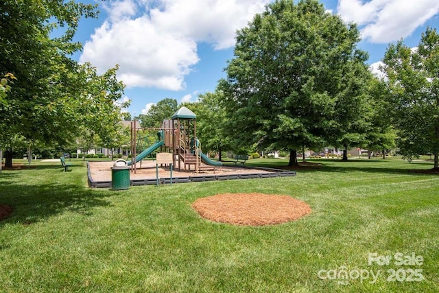 community playground featuring a yard