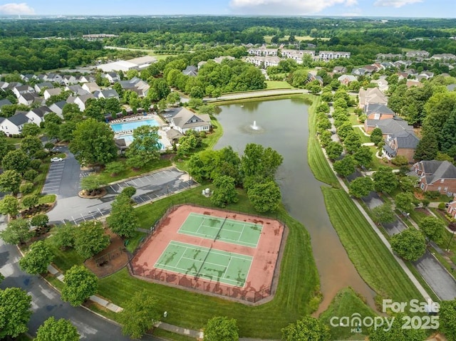 bird's eye view with a water view and a residential view