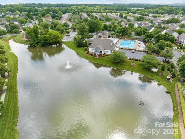 bird's eye view with a water view and a residential view