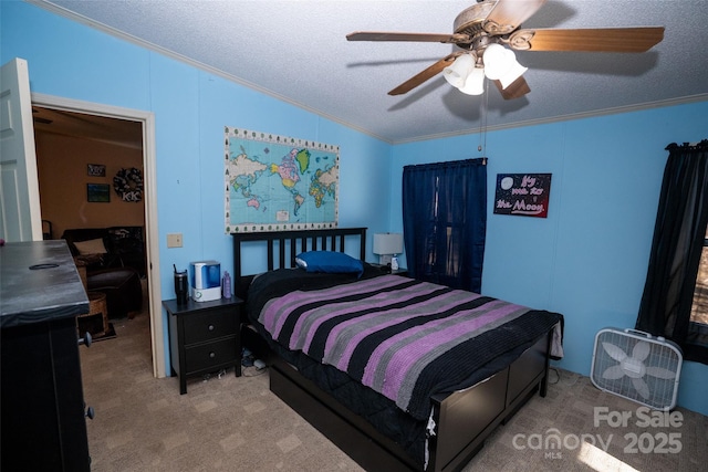 bedroom featuring a textured ceiling, carpet floors, vaulted ceiling, and crown molding